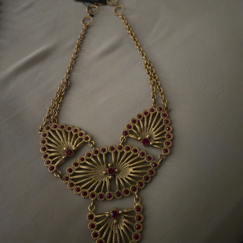 Virgins Saints & Angels Gold Necklace with Red Swarski Crystals Accents.